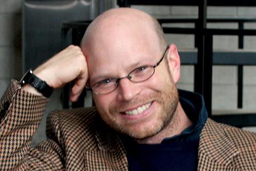 Jimmy Schryver smiles at the camera.