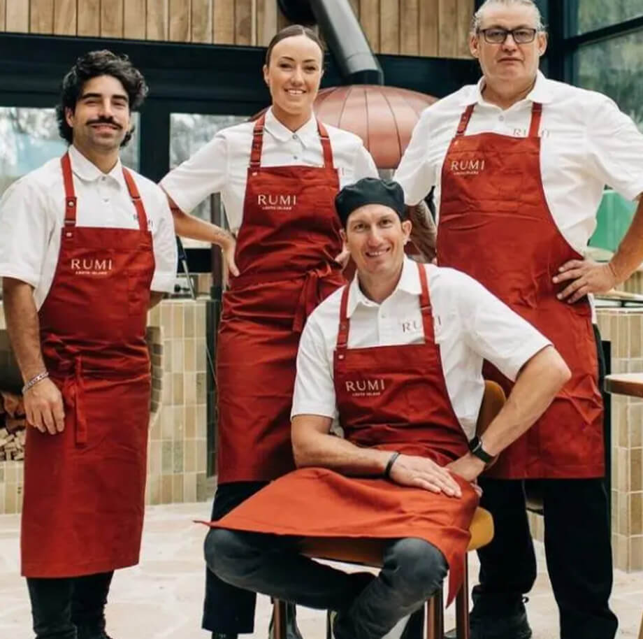 Chefs wearing the Cargo Crew Banjo Chef Apron