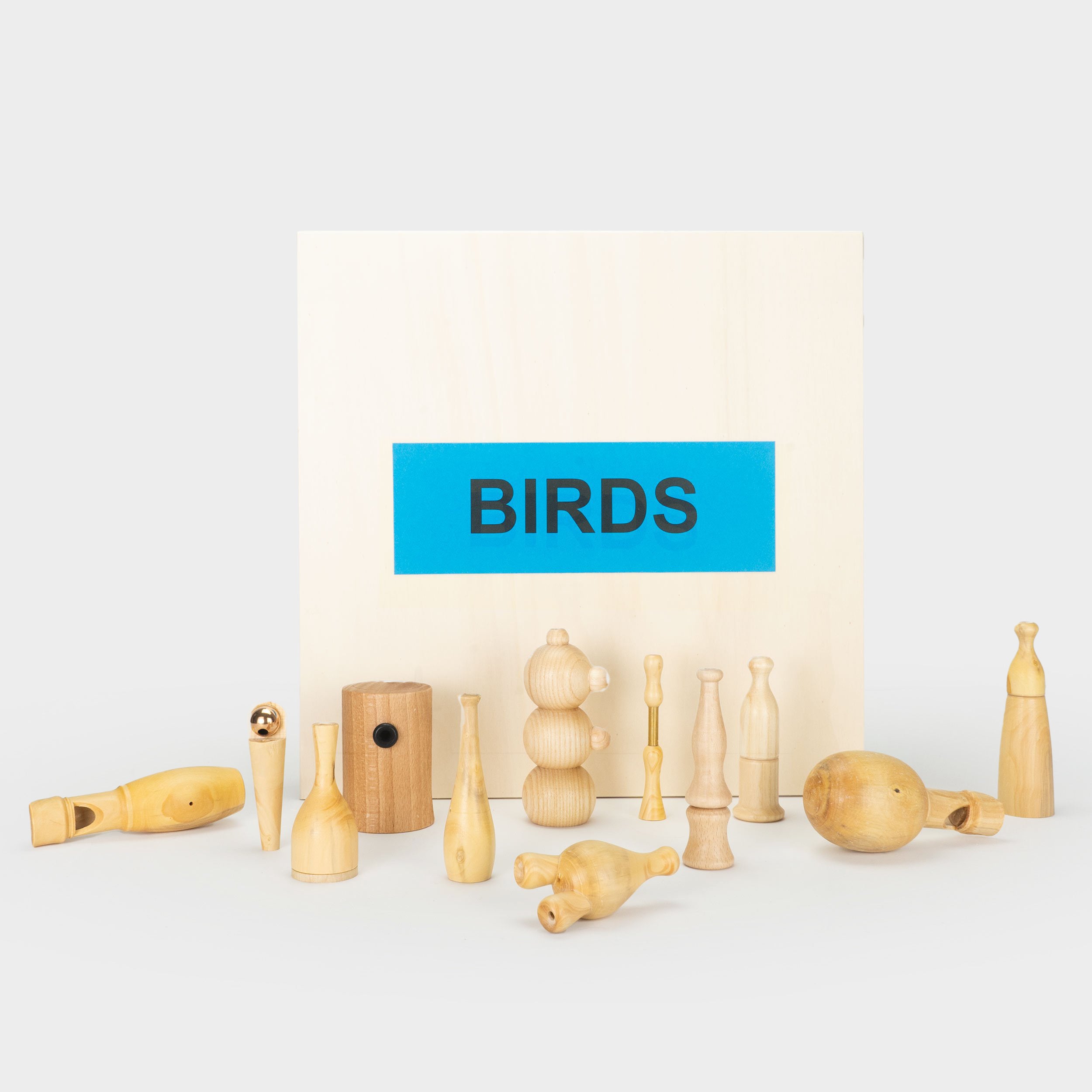 Image of Handmade Wooden Bird Calls - Nests of America- Set of 12