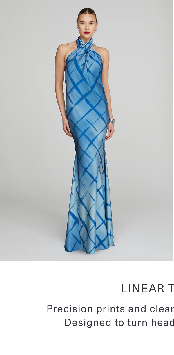 Linear Tension: Precision prints and clean lines dial up the drama. Designed to turn heads, built to stay sharp. Shop Corinne Printed Satin Gown