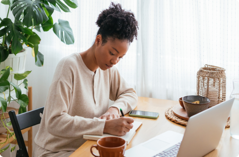 Photo-of-female-focused-while-on-laptop