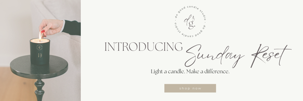 Sunday, Reset header with image of hand lighting a candle