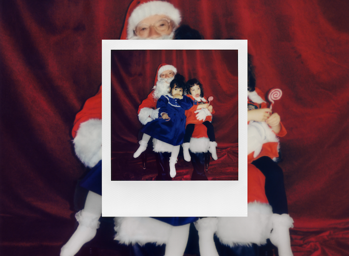 Santa Claus with two children, shot on Polaroid film