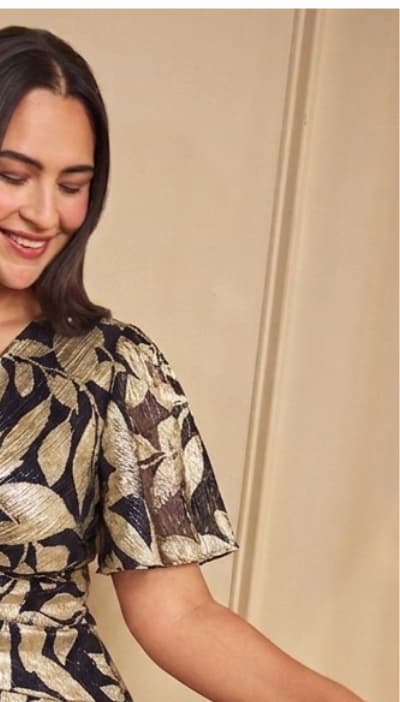 Plus Size Foil Leaf Short Sleeve Gown With Draped Details In Navy Gold