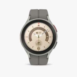 A Samsung Galaxy Watch5 Pro against a light gray tile.