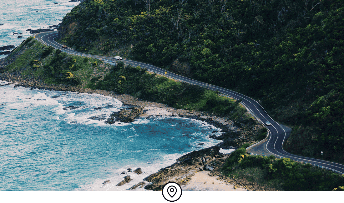 Image Description: A winding road that follows the coast in Australia
