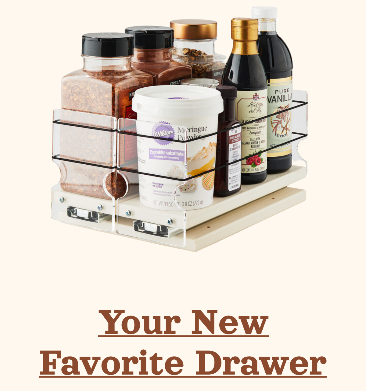 Organized spice drawer with jars, bottles, and containers neatly stored in a pull-out rack system
