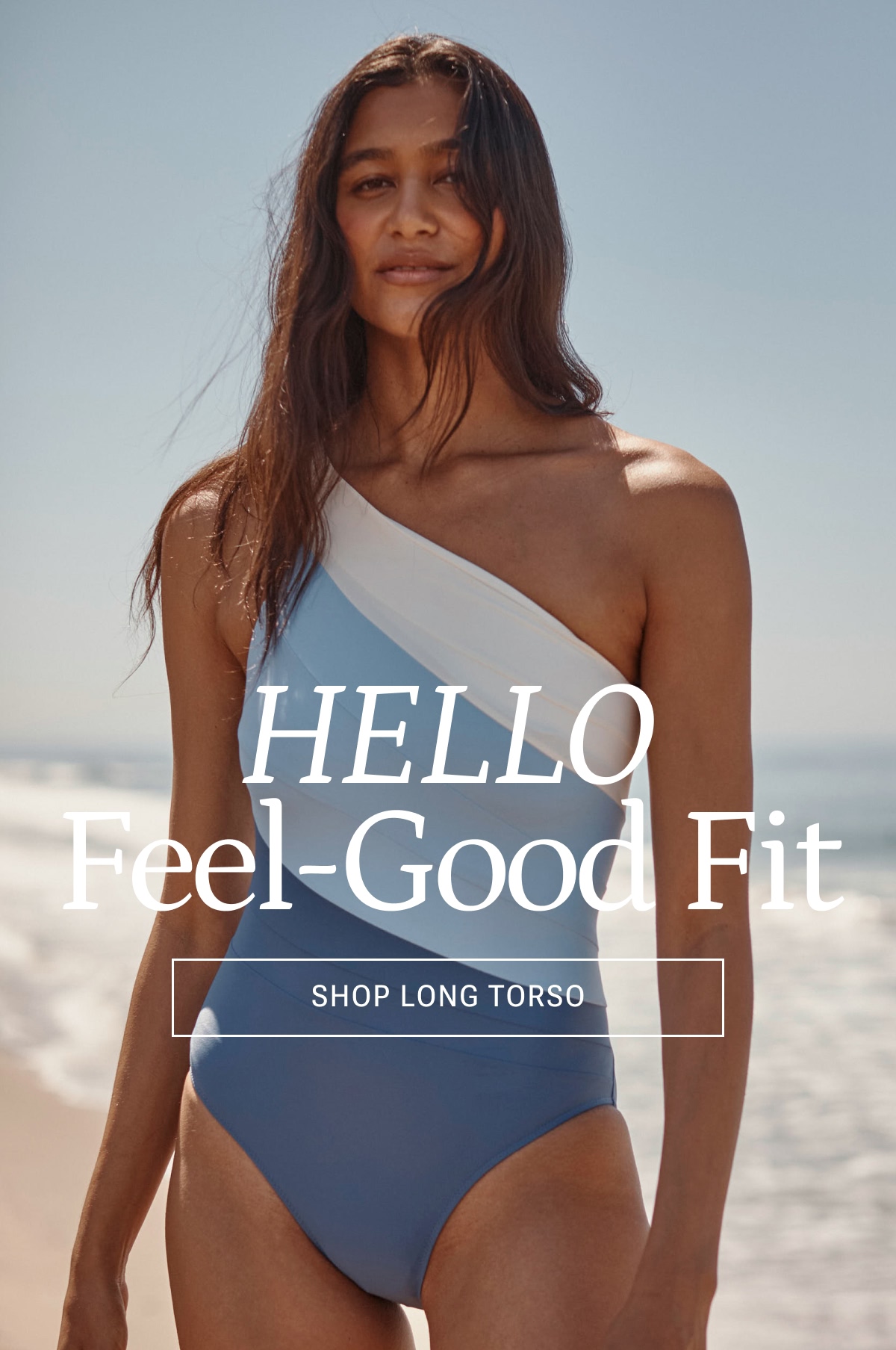 Model in blue and white one piece swimsuit
