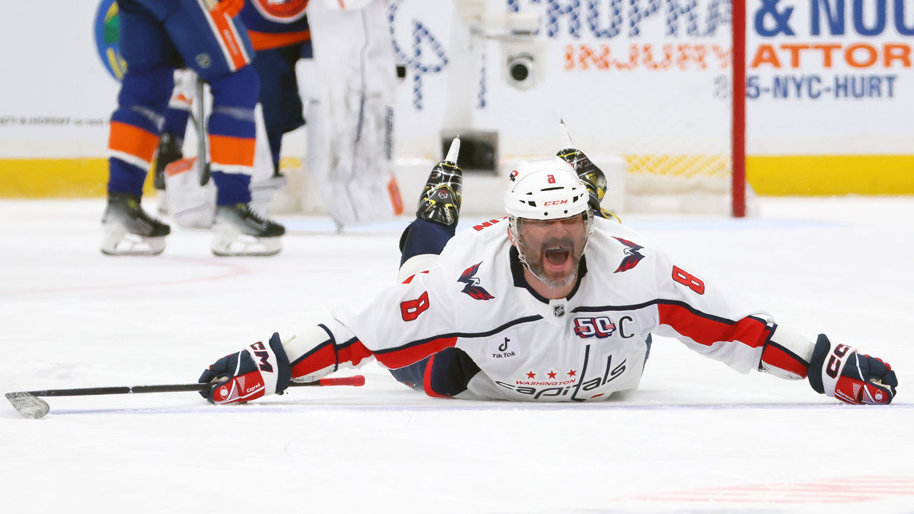Alex Ovechkin of the Washington Capitals celebrates after scoring his 895th career goal during the second period against the New York Islanders.