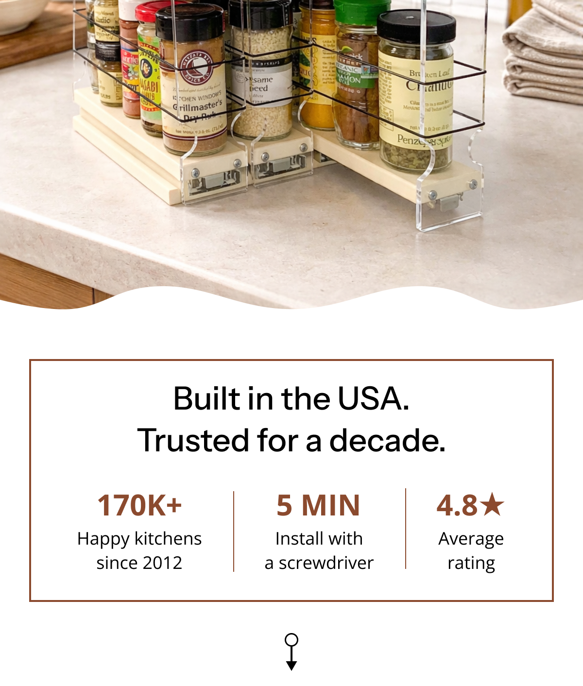 Sliding spice drawer organizer system with pull-out rails and organized spice jars inside kitchen cabinet