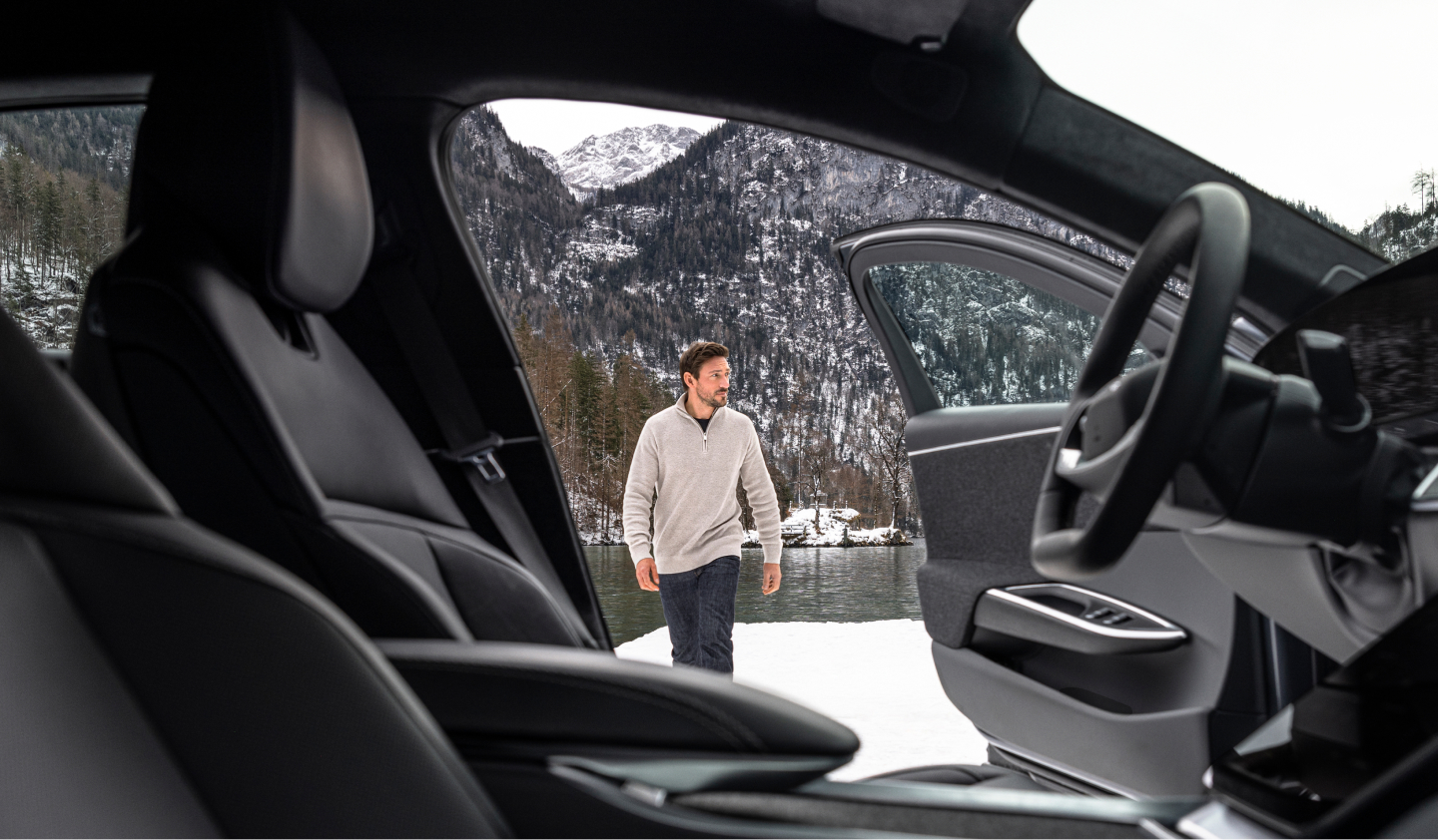 Man walking to a Lucid Air