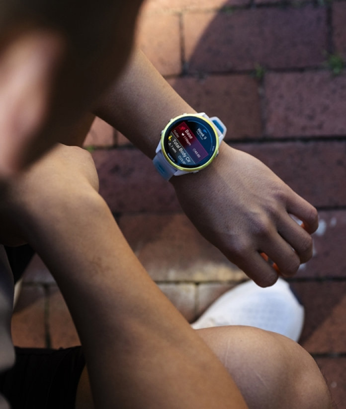 Man wearing Garmin Forerunner 570 smartwatch