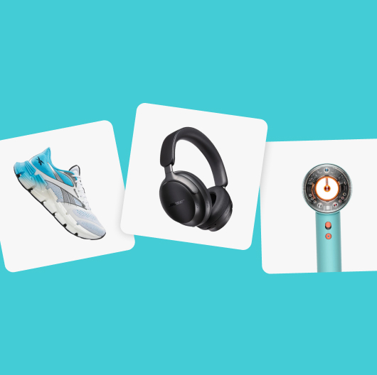 A Reebok FloatZig 1 running shoe, Bose QuietComfort headphones, and a Dyson Supersonic Nural hair dryer sit on white tiles against a turquoise blue background.
