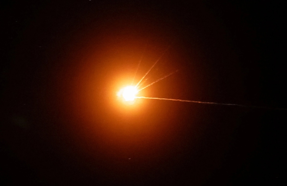 A Russian missile explodes upon being intercepted above Kyiv