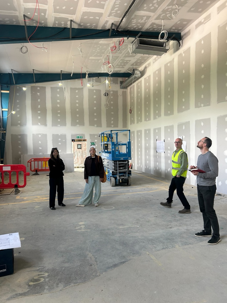 Harley and Lisa inspecting the new brewery