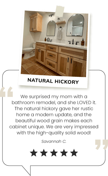 Bathroom with hickory cabinets and round mirrors.