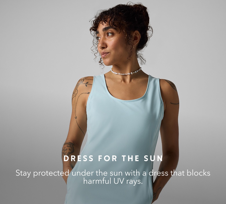 Woman wearing Columbia sun protection dress in a studio.