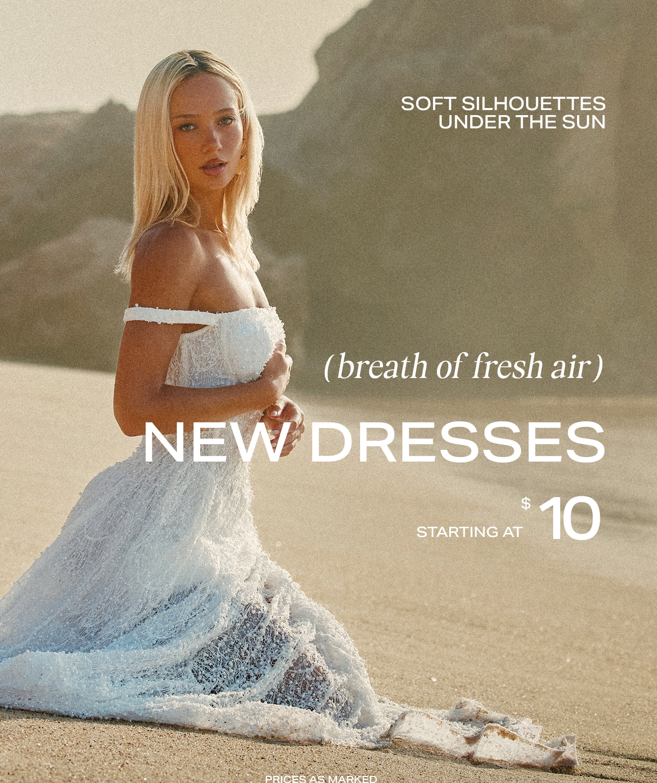 New Dresses: Blonde woman in white off-shoulder soft silhouette dress on sunny beach. Styles starting at $10. Shop now!