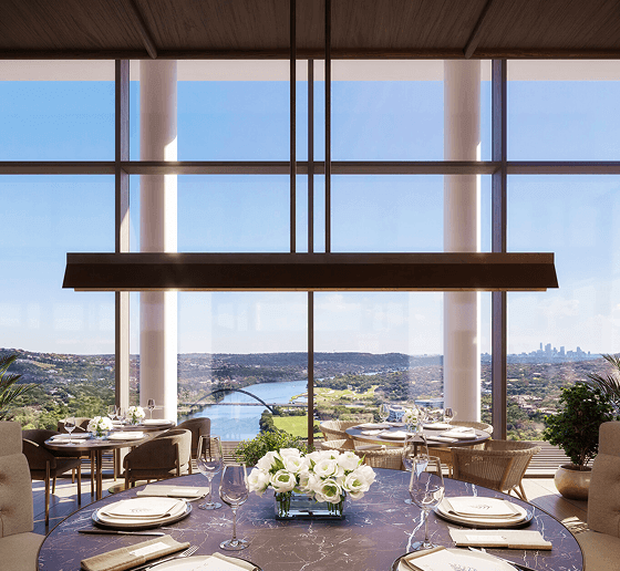 Elegant dining venue with floor-to-ceiling windows overlooking Lake Austin.