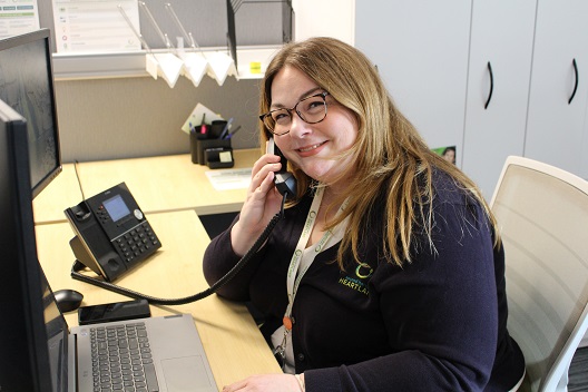 Care Center team member on phone