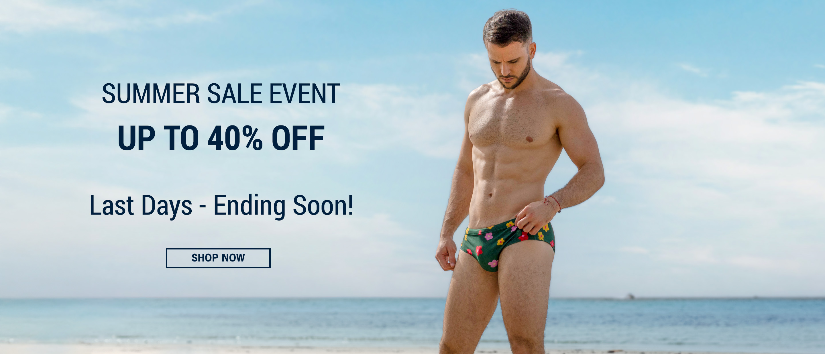 DC2 Summer Sale Event — model wearing green Buy Myself Flowers swim briefs at the beach, up to 40% off, last days ending soon.