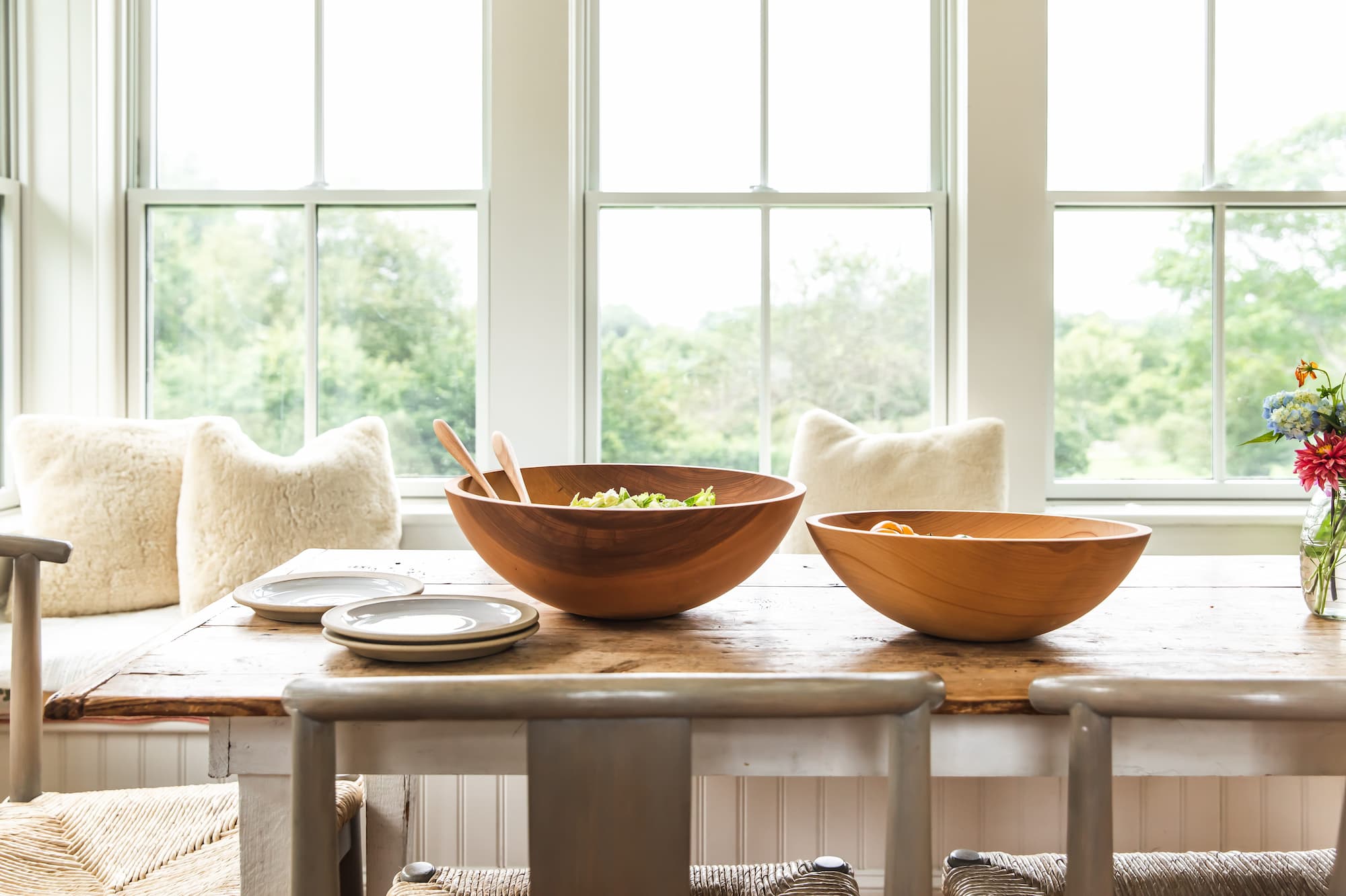 Wooden boards and bowls resting on a Vermont kitchen table