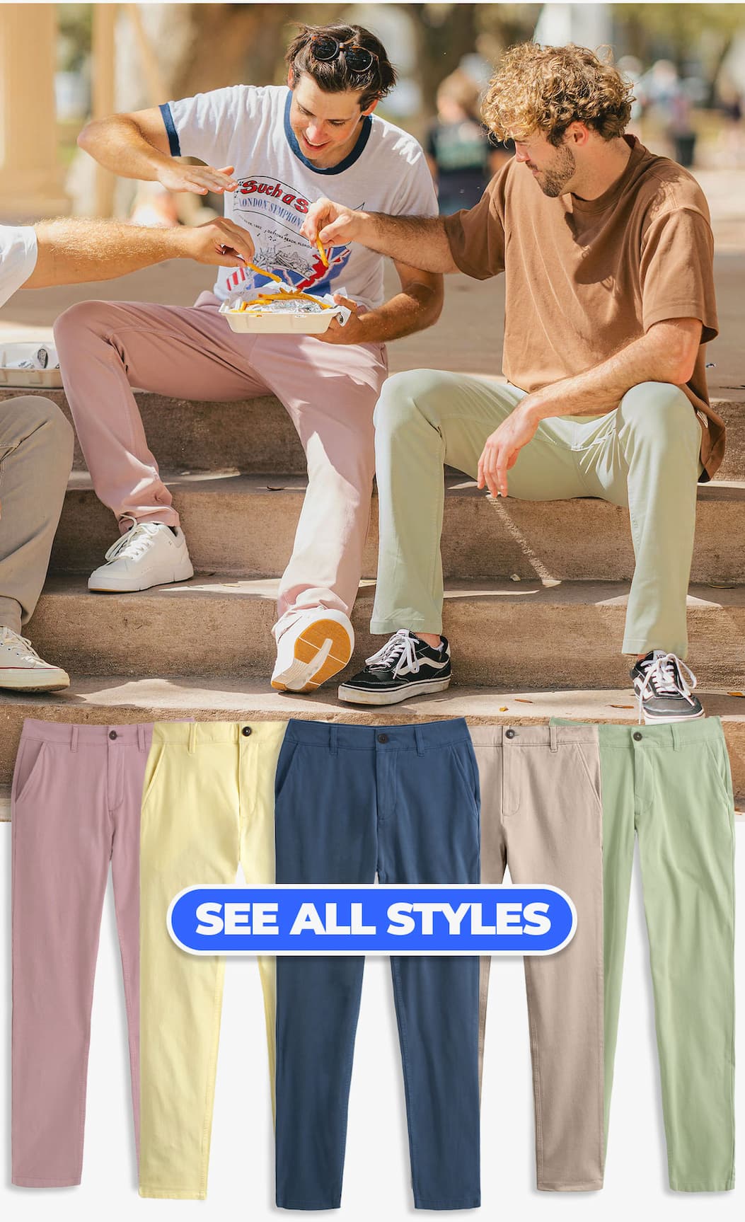 [image of friends sharing french fires at the park wearing chinos.] button to see all styles