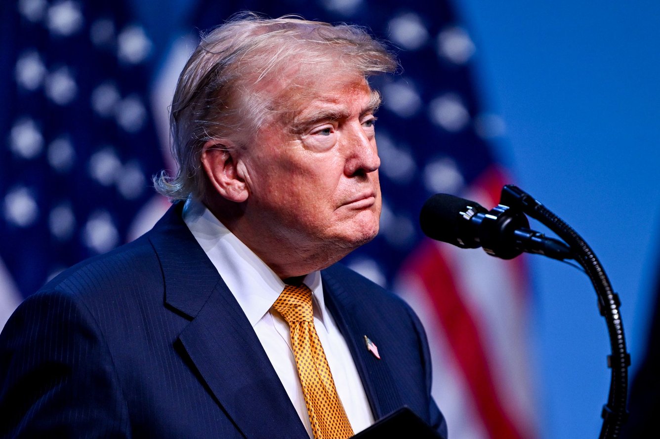 Trump at the podium during NATO summit