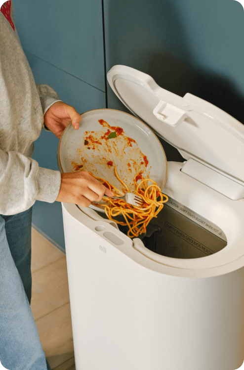 Photo of a Mill with food scraps in it.