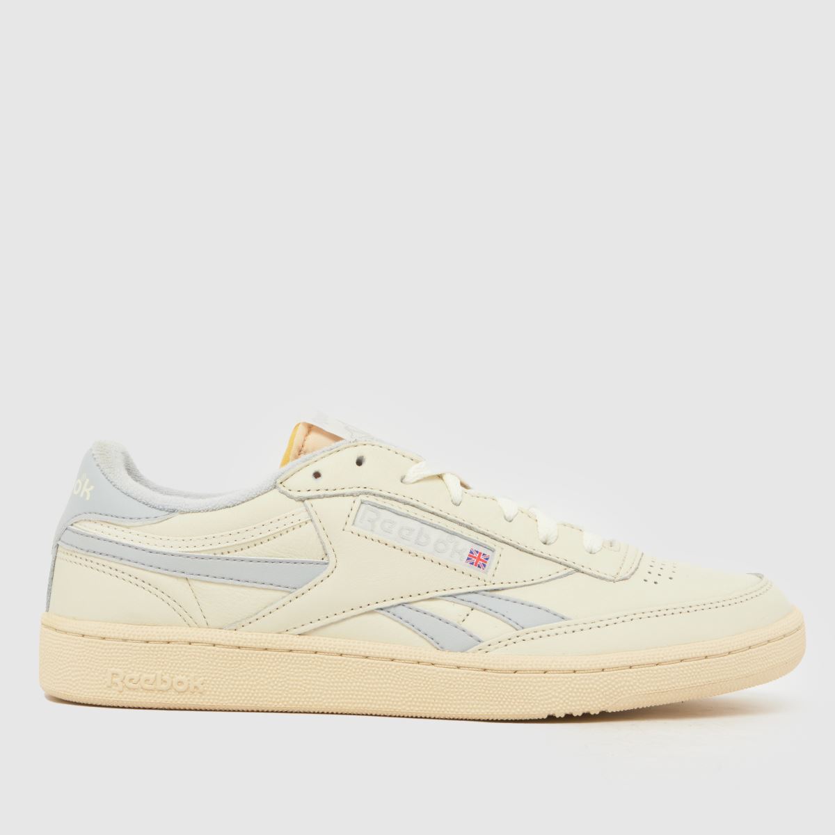 A pair of white and grey Reebok trainers