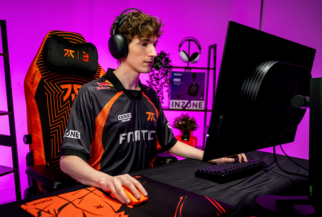 An image of a gammer sitting in his room playing on his Inzone Mouse-A Lightweight Wireless Gaming Mouse, Inzone KBD-H75 Aluminum Rapid Trigger 8K RGB 75% Gaming Keyboard, and his 27inch Inzone M10S II 1440p 540Hz OLED 0.02ms Gaming Monitor.