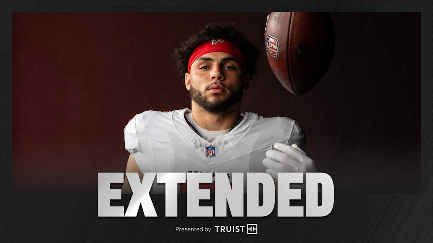 Drake London posing with football, 'Extended presented by Truist'