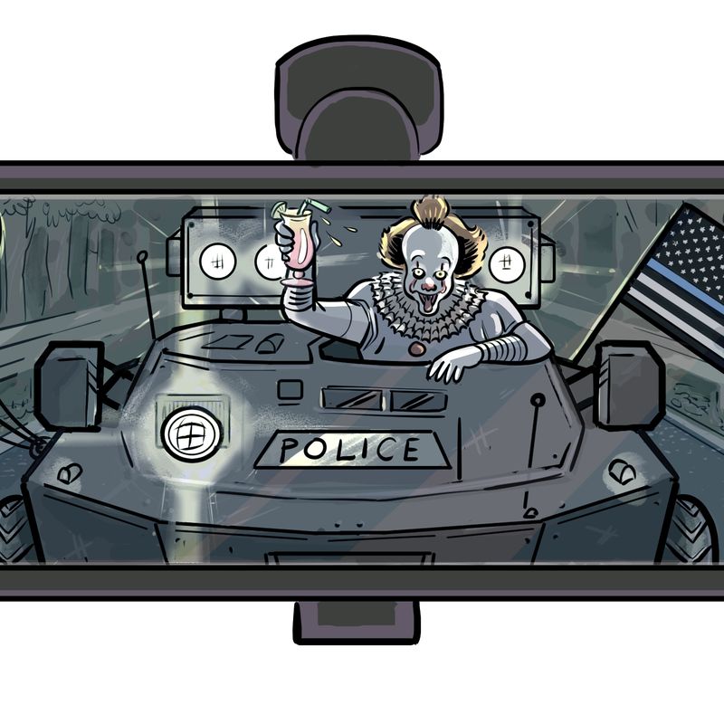 Pennywise driving a decommissioned military police tank in the rearview mirror.