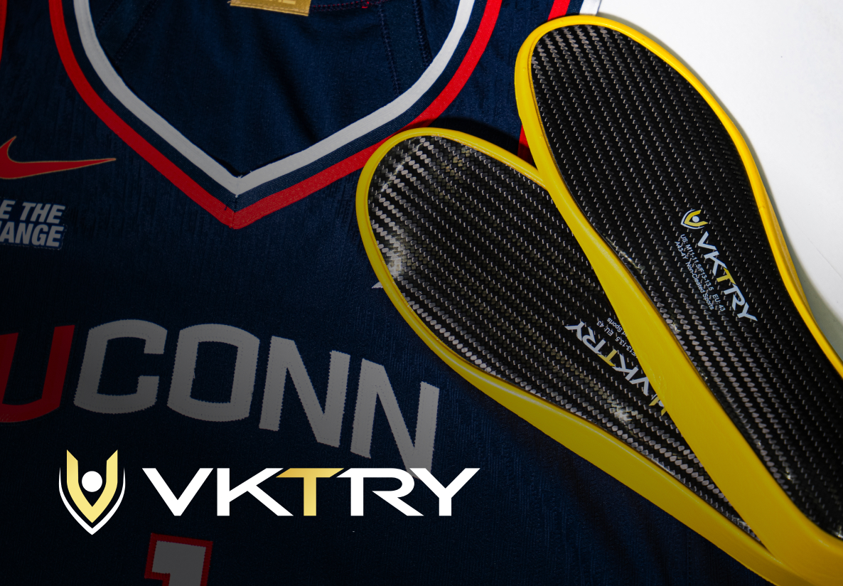 VKTRY insoles next to a UCONN basketball jersey