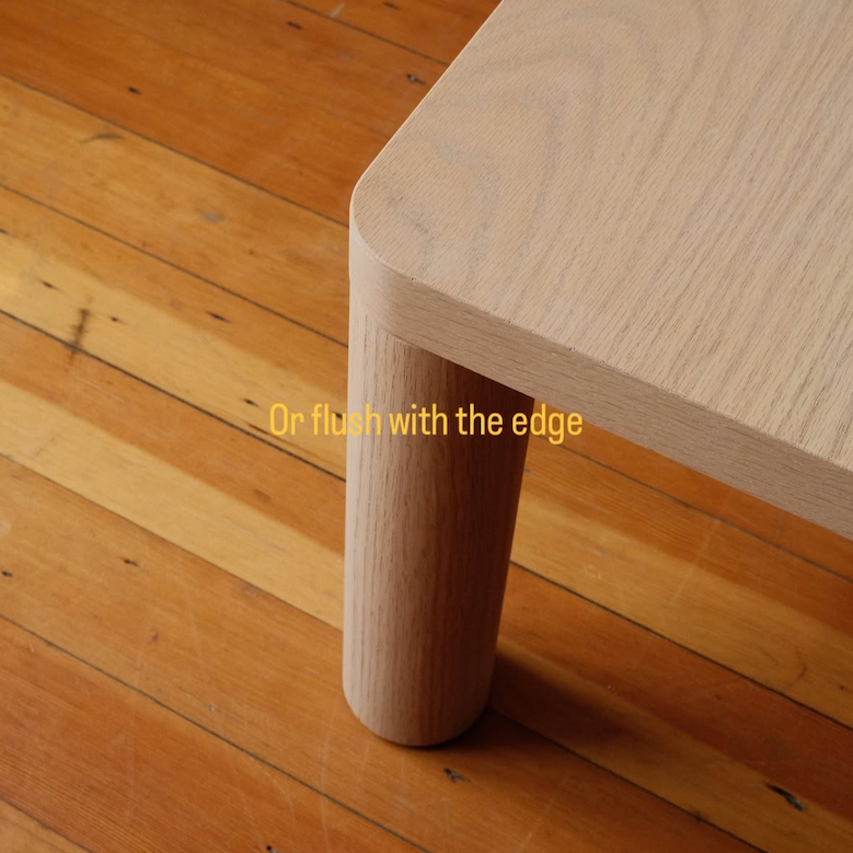 Keeps Minimalist Coffee Table in Light Natural Finish with flush mount adjustable legs