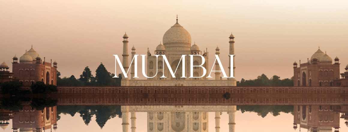 The Taj Mahal at sunset; the image includes the text 'Mumbai'.