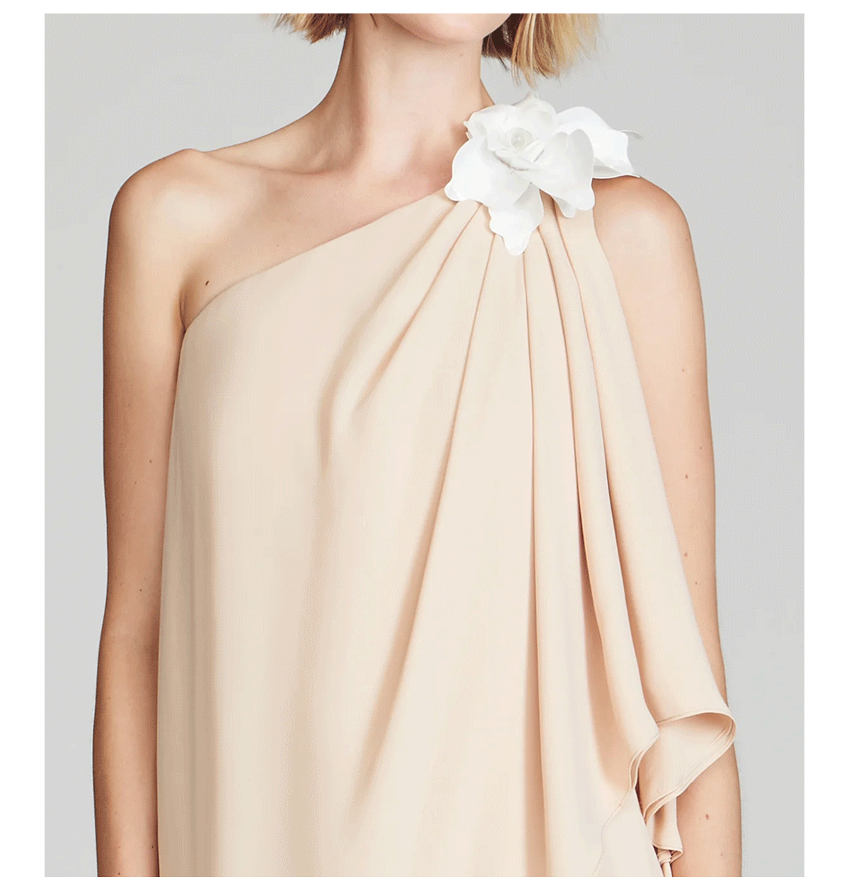 From romantic strapless gowns to versatile midi dresses, find pieces that breathe spring into every occasion.