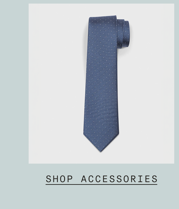 Blue dotted necktie displayed against a light background. Text: "SHOP ACCESSORIES"