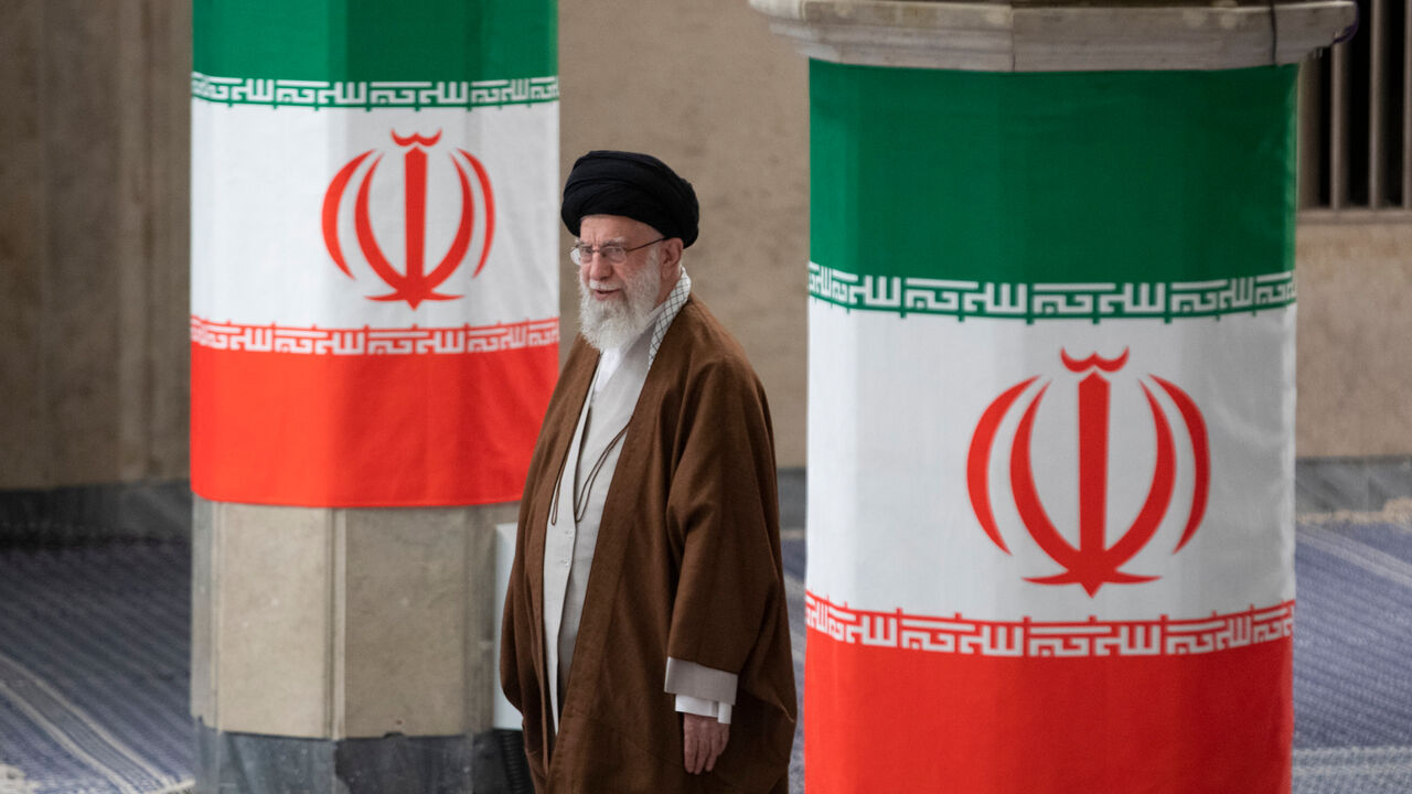 Iranian Supreme Leader Ayatollah Ali Khamenei arrives to vote for the parliamentary runoff elections.