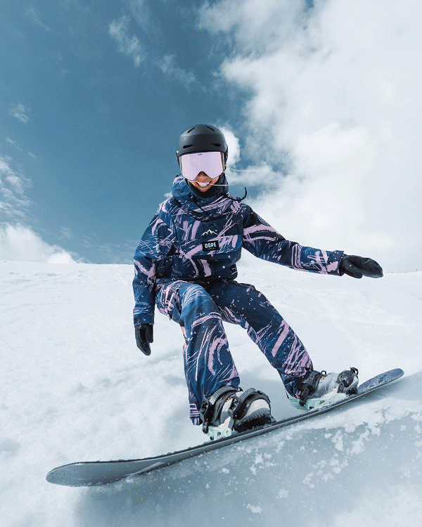 Two animated snowboarding images: snowboarder in green jacket and beanie adjusting sunglasses on sunny slope and a snowboarder in blue patterned suit riding down snowy slope.