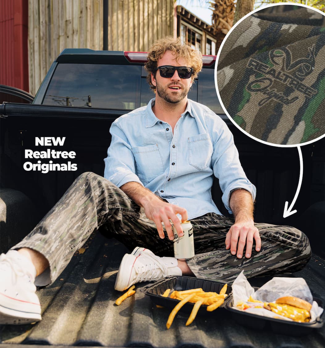 NEW Realtree Originals. (IMG of man in Realtree Original jeans) 