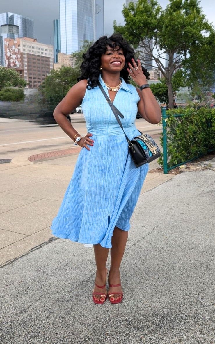 Kahindo wearing the Double Collar Dress