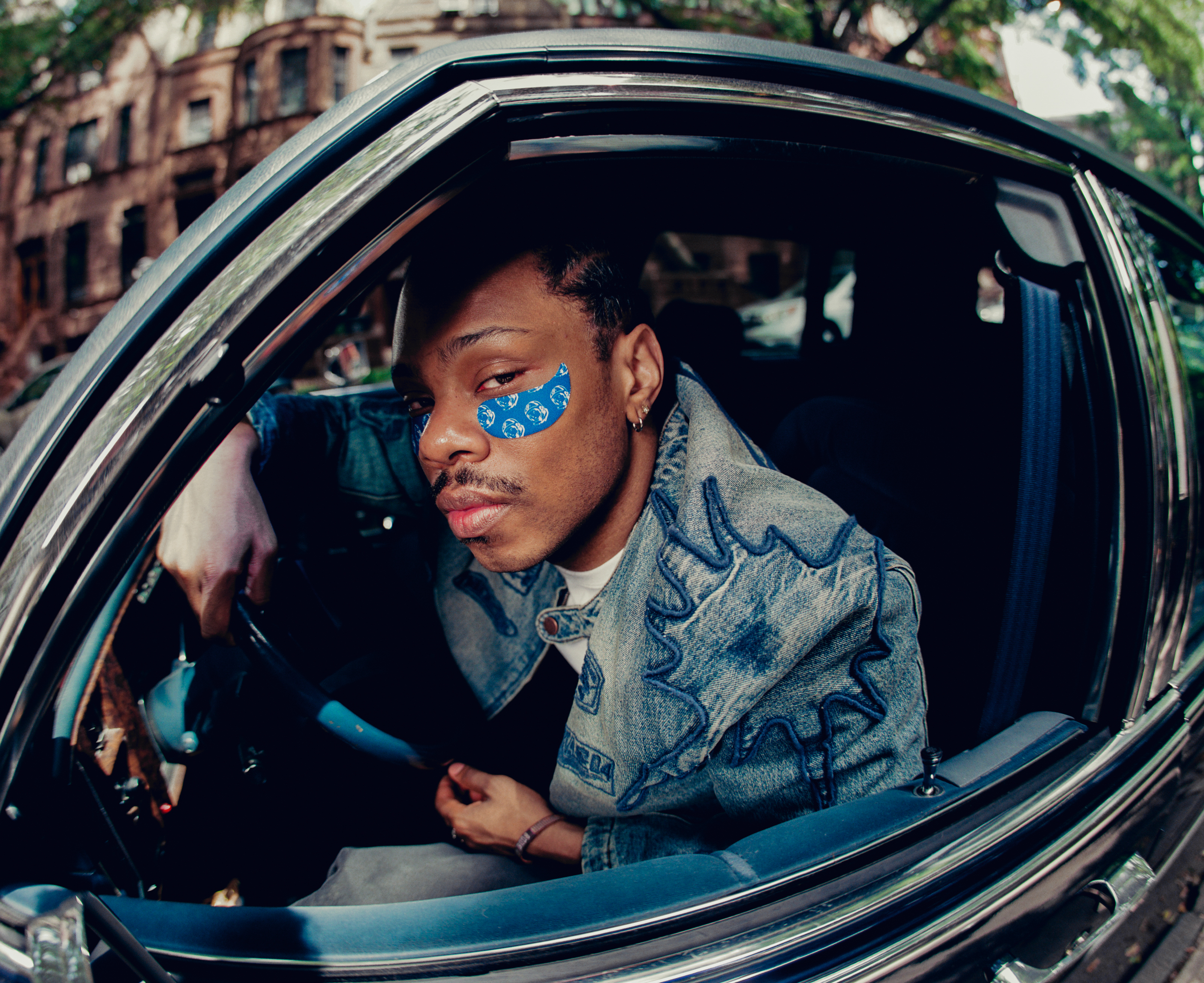 Model wearing Billionaire Boys Club x Topicals Faded Eye Mask