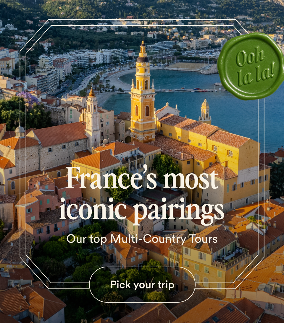 Go Ahead Tours hero overlooking a colorful French Riviera town with France’s most iconic pairings headline — opens France tours.