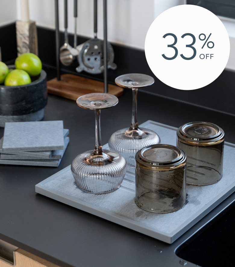 Upside-down glasses on a tray, 33% off offer.