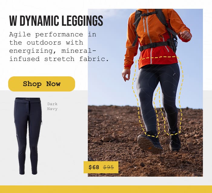 Action photo of a woman running down a mountainous scree slope while wearing Dynamic Leggings.