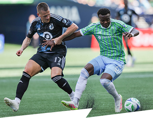 Robin Lod takes on Nouhou in a recent match against Seattle