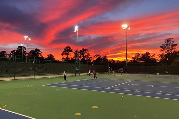 Sunset over tennis court