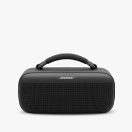 A Bose SoundLink Max Portable Bluetooth Speaker on a gray tile.