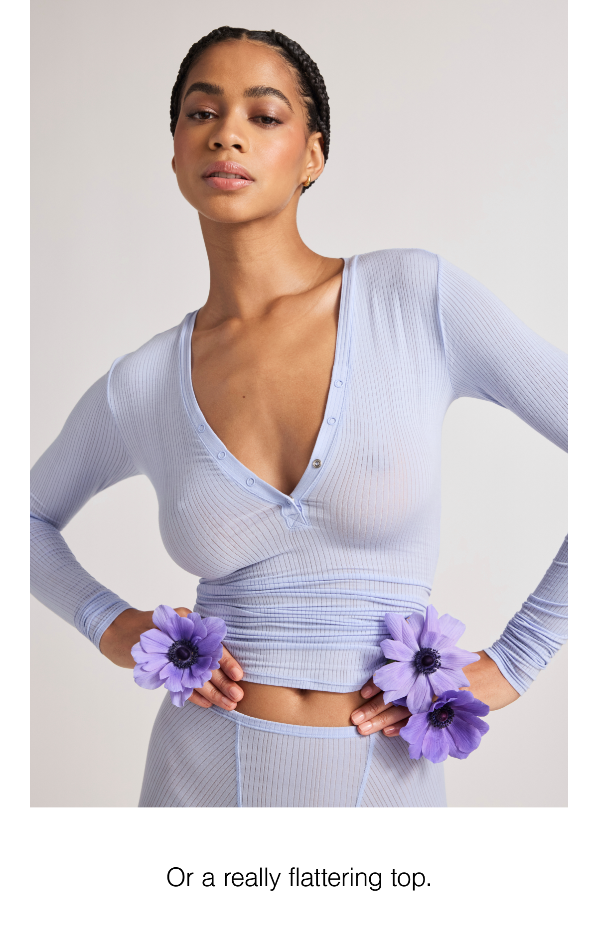 Nothing says gratitude like a really flattering top. Shop the Whipped Henley in Muse. 